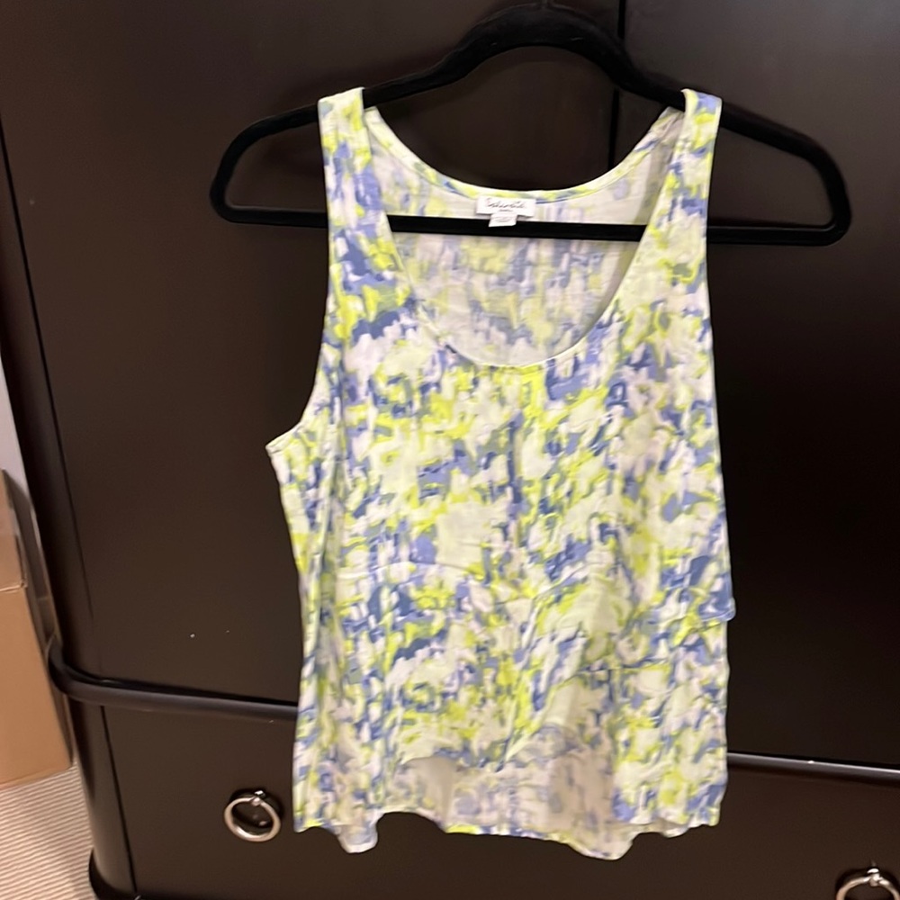 Splendid tank. Brand new. Never worn. Longer in the back. Size small but lose.